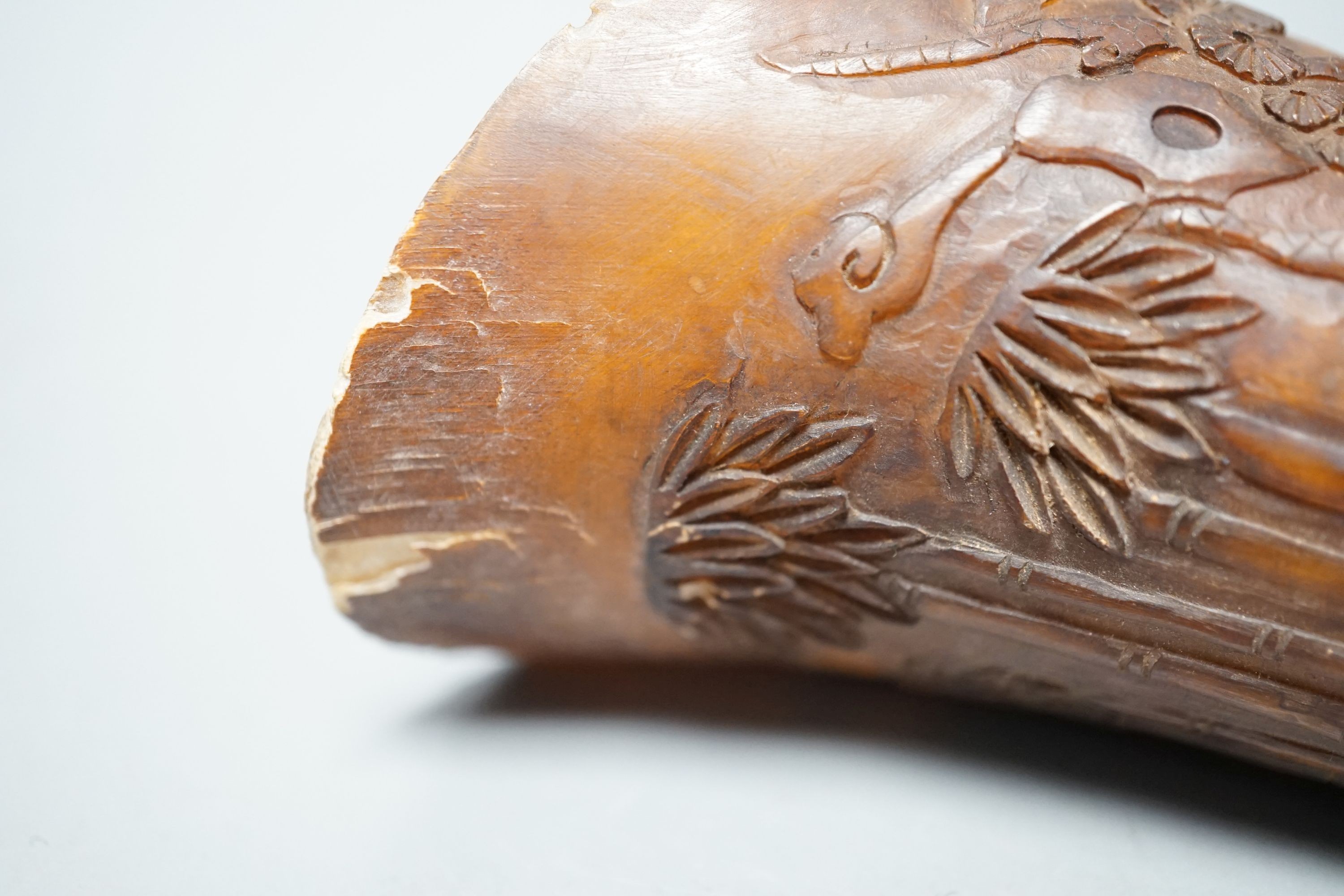 A Chinese carved horn cup 13cm